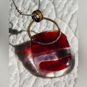 Red and pink glass pendant on 925 Sterling silver wire chain.